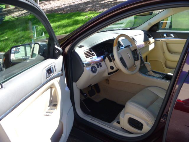 2011 Lincoln MKS 2007 Mazda Mazda3 S Sport