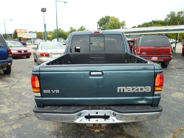 1999 Mazda B-Series Ebony CUST LTH APPT