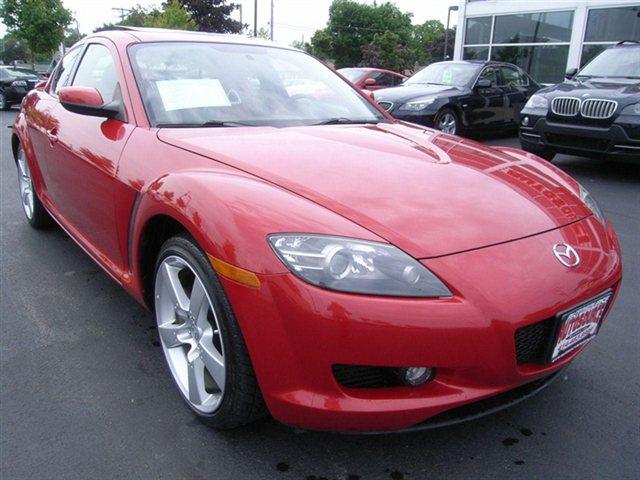 2004 Mazda RX-8 2011 Dodge Ram ST