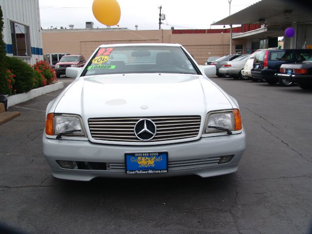 1992 Mercedes-Benz 300 2011 Dodge Ram ST
