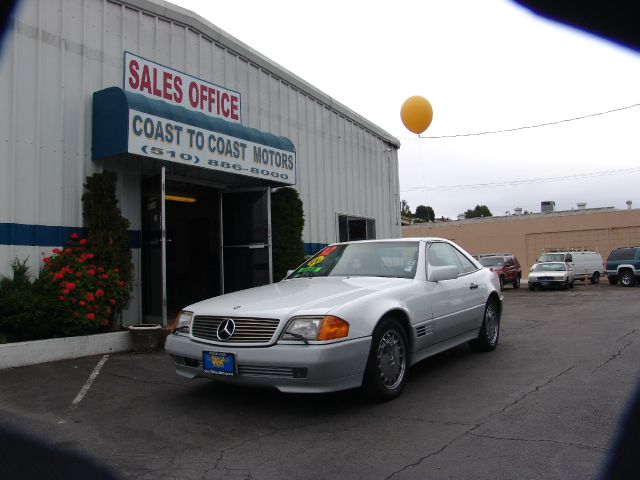 1992 Mercedes-Benz 300 2011 Dodge Ram ST