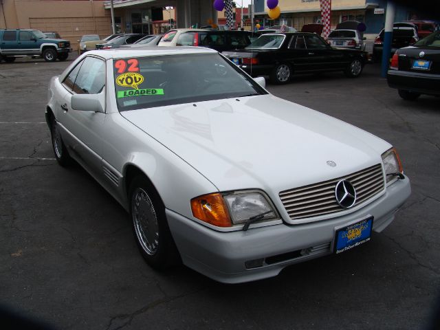1992 Mercedes-Benz 300 2011 Dodge Ram ST