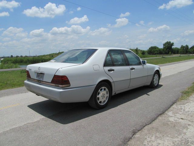 1993 Mercedes-Benz 300 2011 Dodge Ram ST