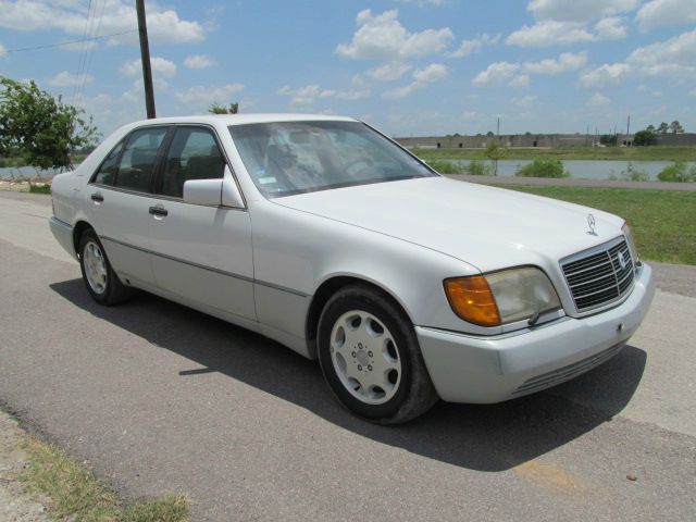 1993 Mercedes-Benz 300 2011 Dodge Ram ST