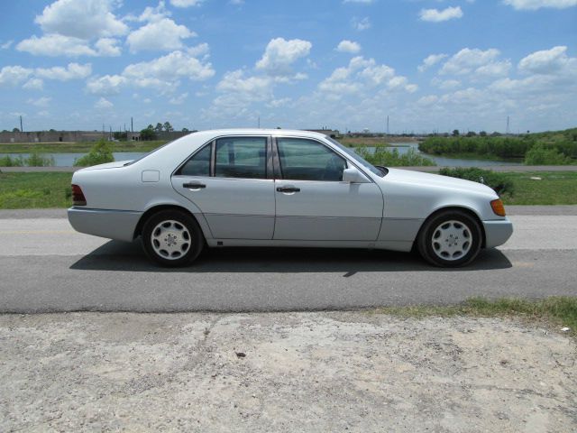 1993 Mercedes-Benz 300 2011 Dodge Ram ST