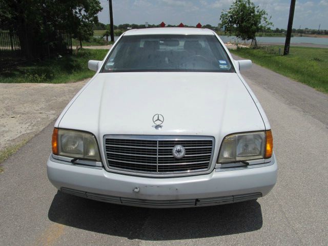 1993 Mercedes-Benz 300 2011 Dodge Ram ST