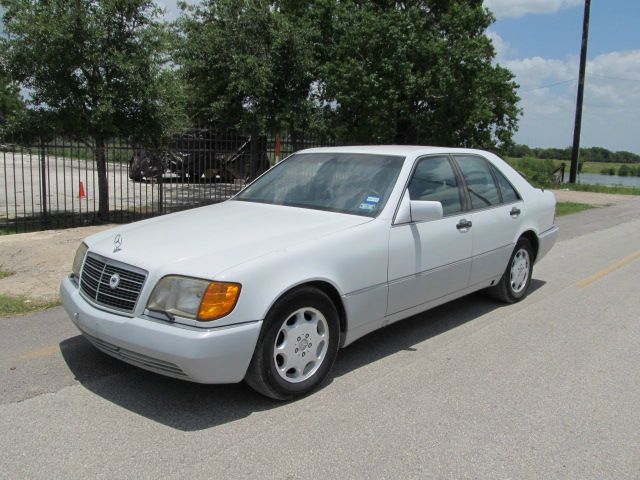 1993 Mercedes-Benz 300 2011 Dodge Ram ST