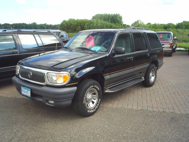 1998 Mercury Mountaineer Ram 1500 Quad Cab SLT Pickup 4D 6 1/4 Ft