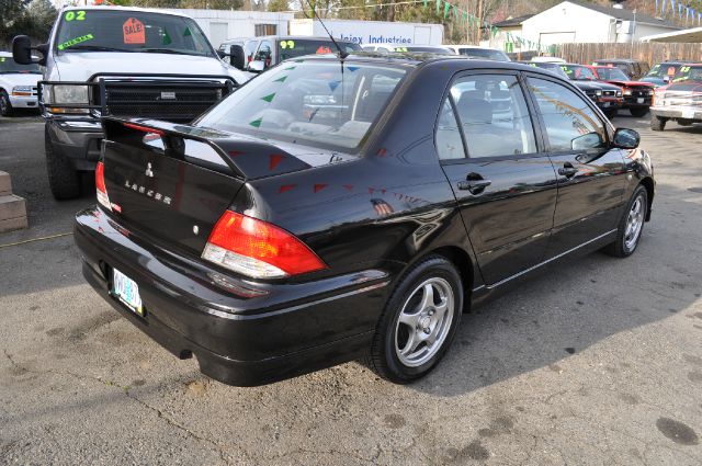 2002 Mitsubishi Lancer LE 2WD 7-pass