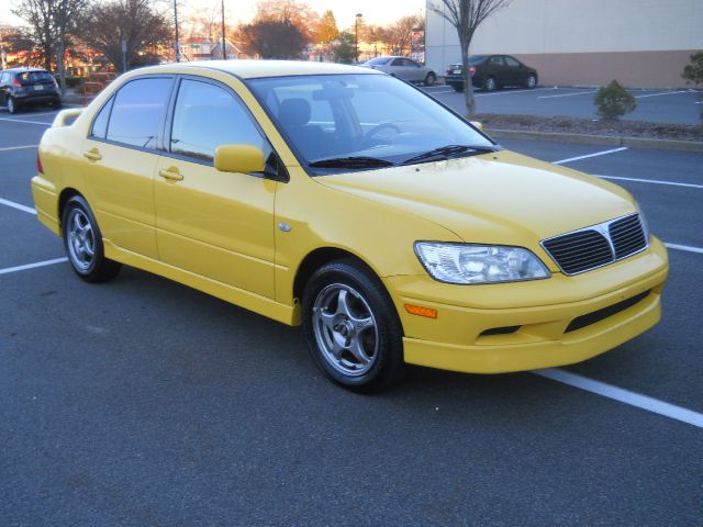 2002 Mitsubishi Lancer LE 2WD 7-pass
