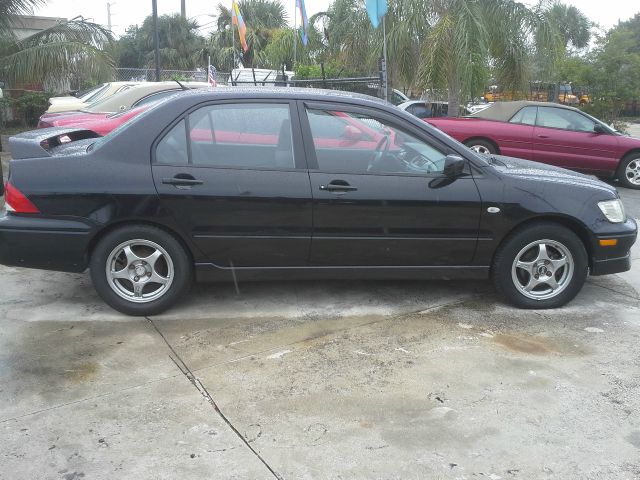 2003 Mitsubishi Lancer LE 2WD 7-pass