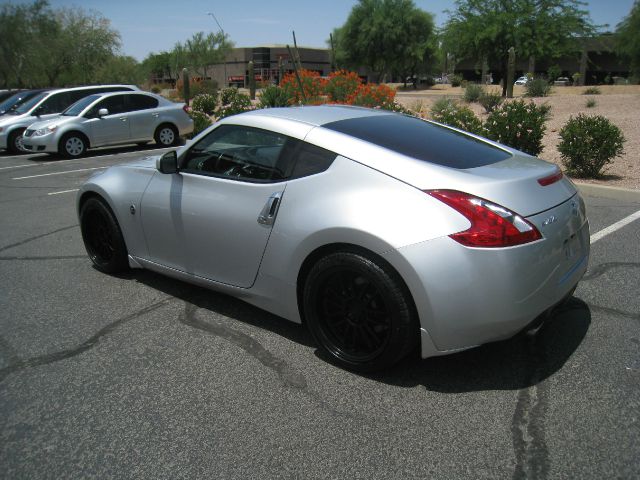 2011 Nissan 370Z 1998 Ford XL