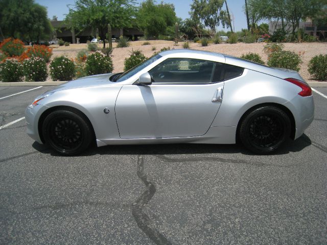 2011 Nissan 370Z 1998 Ford XL