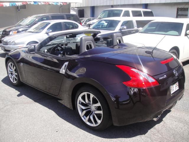 2012 Nissan 370Z 1998 Ford XL