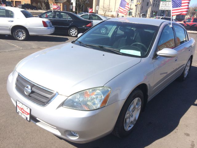2004 Nissan Altima RAM 2500 CREW SLT