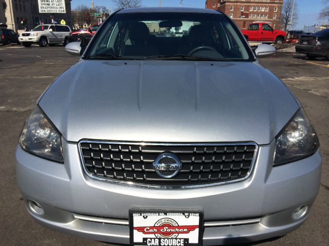 2006 Nissan Altima RAM 2500 CREW SLT