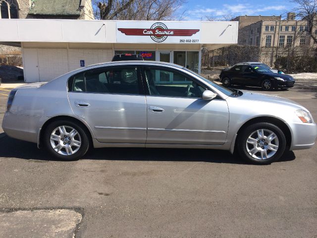 2006 Nissan Altima RAM 2500 CREW SLT