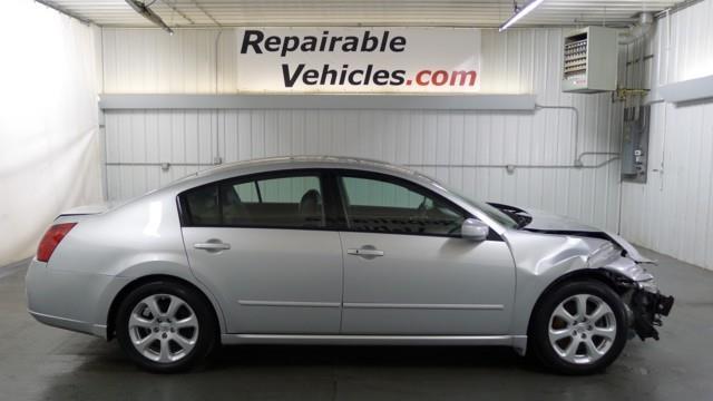 2007 Nissan Maxima Flatbed Truck