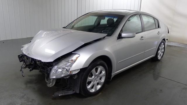 2007 Nissan Maxima Flatbed Truck