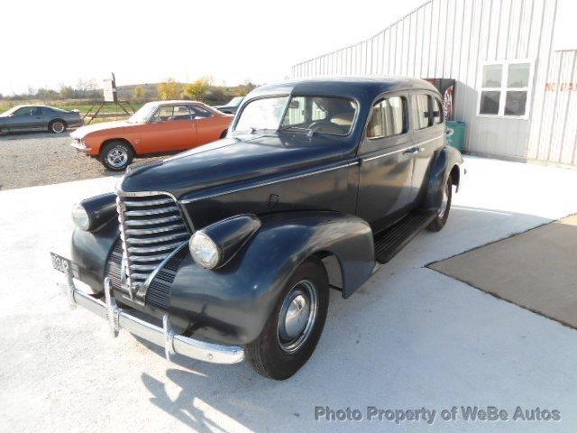 1938 Oldsmobile 4 Door 1995 Pontiac