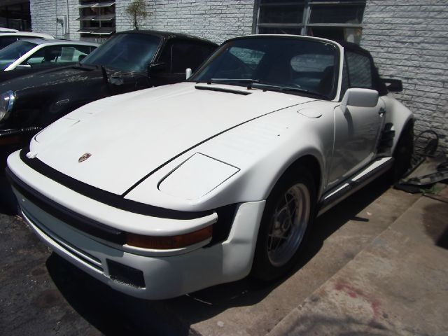 1978 Porsche 911 2004 Jeep Sport