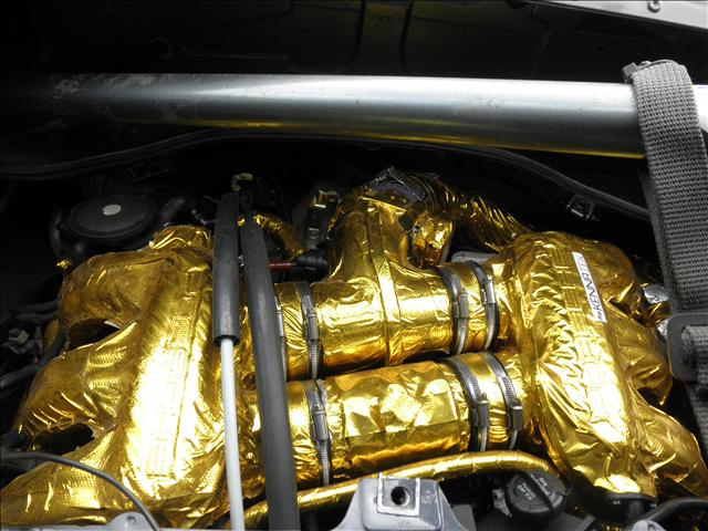 2004 Porsche Boxster 2011 Ford LX