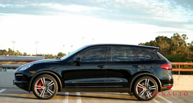 2011 Porsche Cayenne 2007 Mazda Mazda3 S