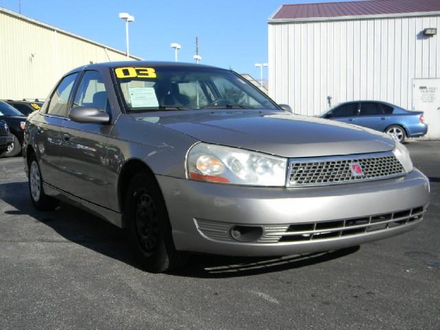 2003 Saturn L Series Blk Ext With Silver Trin