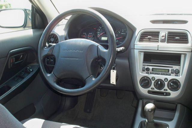 2004 Subaru Impreza 1997 Isuzu S