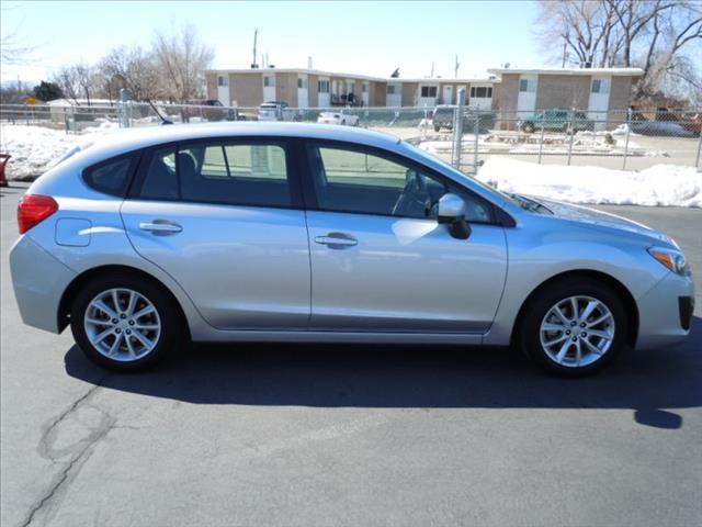 2012 Subaru Impreza 2011 Nissan LE