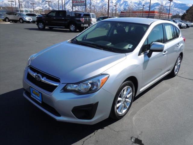 2012 Subaru Impreza 2011 Nissan LE