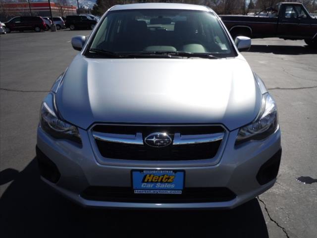2012 Subaru Impreza 2011 Nissan LE