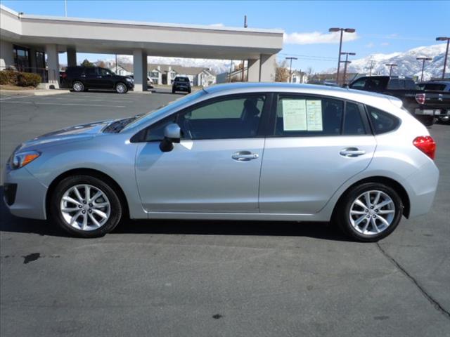 2012 Subaru Impreza 2011 Nissan LE