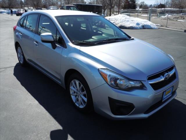 2012 Subaru Impreza 2011 Nissan LE