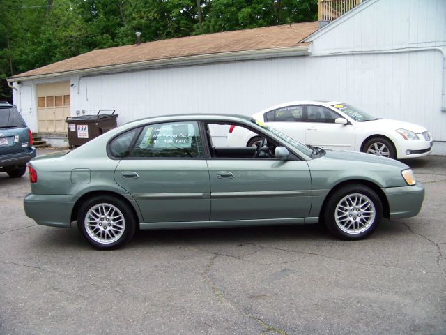 2003 Subaru Legacy Ford F250 FX4 Lariat