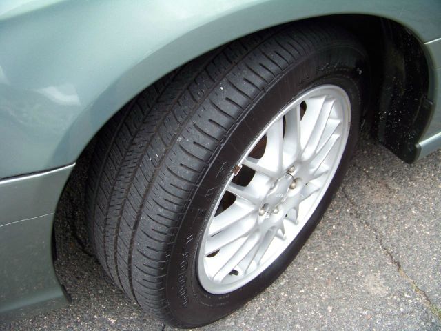 2003 Subaru Legacy Ford F250 FX4 Lariat