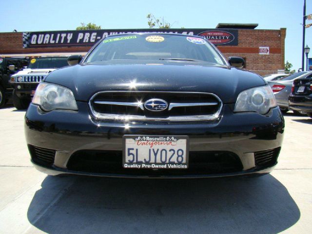 2005 Subaru Legacy Ford F250 FX4 Lariat