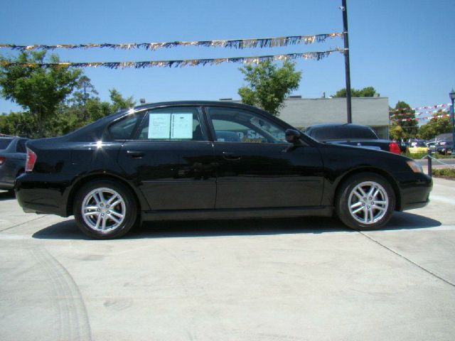 2005 Subaru Legacy Ford F250 FX4 Lariat