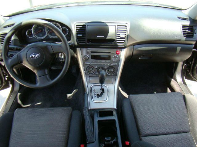 2005 Subaru Legacy Ford F250 FX4 Lariat