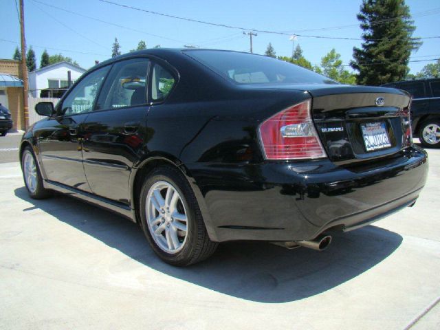 2005 Subaru Legacy Ford F250 FX4 Lariat