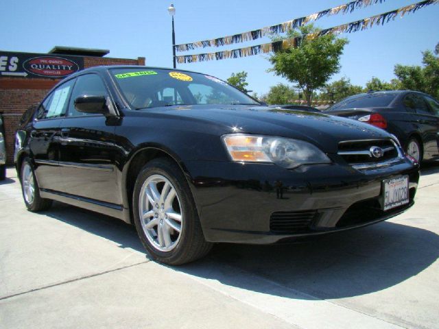 2005 Subaru Legacy Ford F250 FX4 Lariat