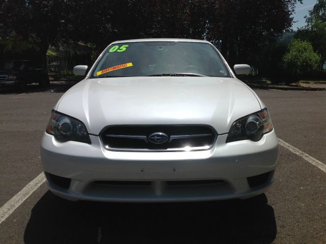 2005 Subaru Legacy Ford F250 FX4 Lariat