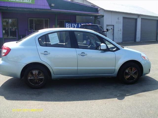2009 Suzuki SX4 Sedan 2006 Mazda I