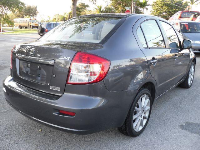 2011 Suzuki SX4 Sedan Bucket Lift
