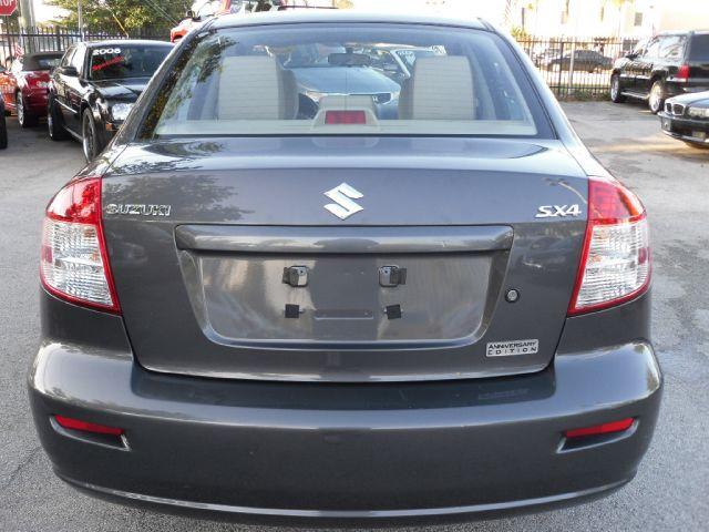 2011 Suzuki SX4 Sedan Bucket Lift