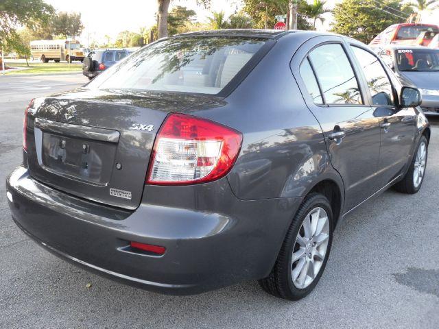 2011 Suzuki SX4 Sedan Bucket Lift