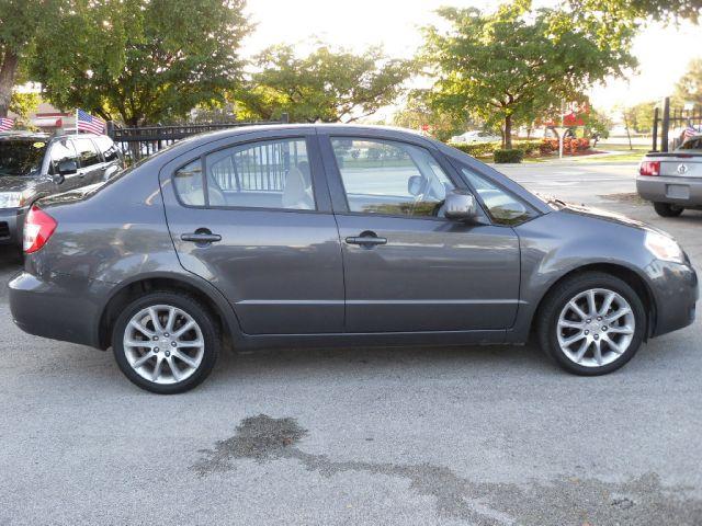 2011 Suzuki SX4 Sedan Bucket Lift