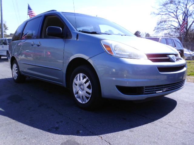 2005 Toyota Sienna 1994 Chevrolet 1500 Silverado