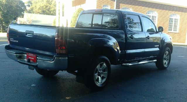 2005 Toyota Tacoma 2011 Kia SX