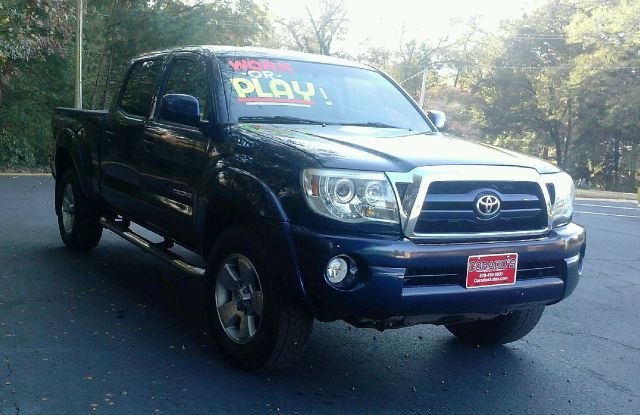 2005 Toyota Tacoma 2011 Kia SX